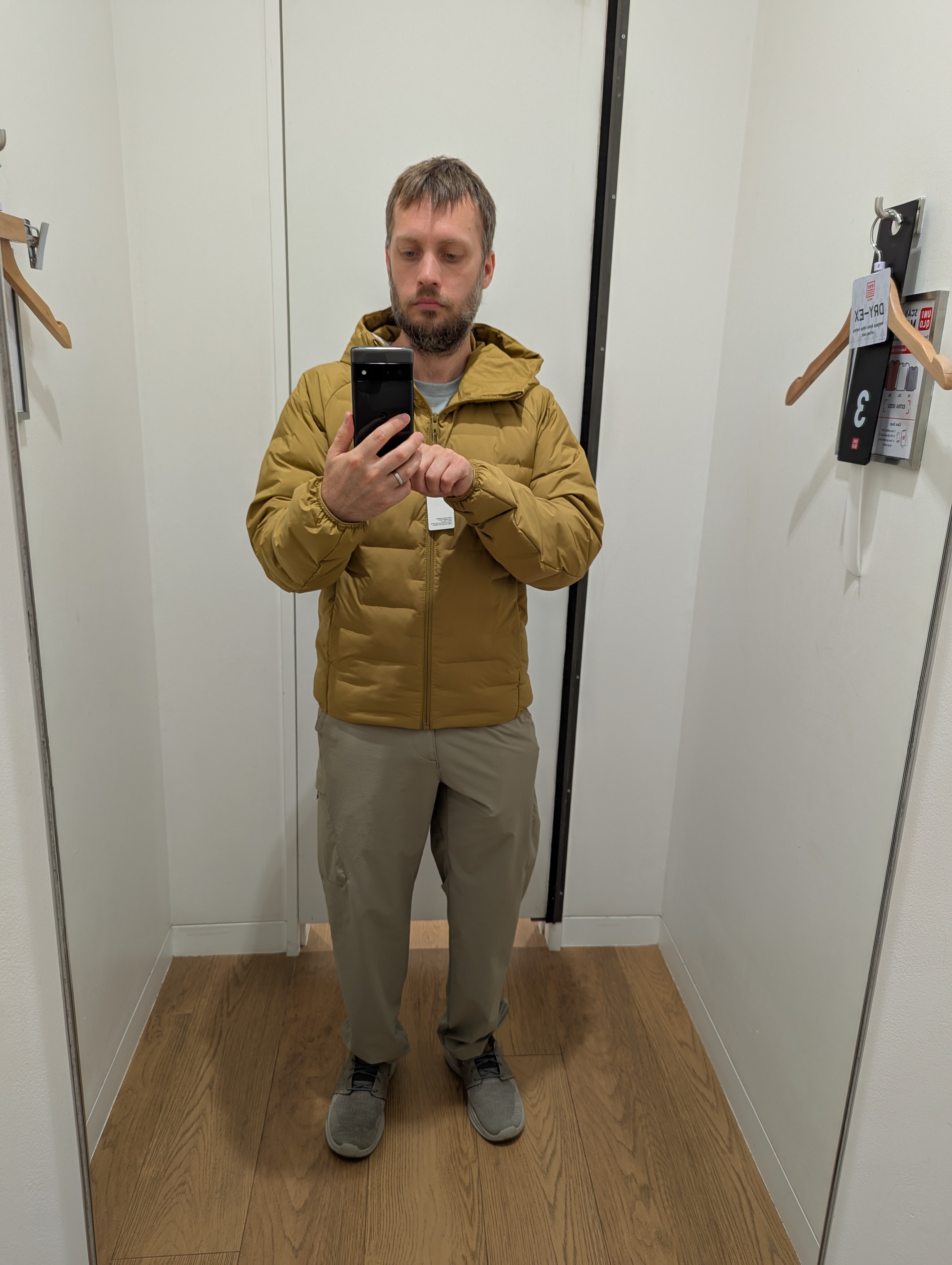 Trying on clothes in Uniqlo